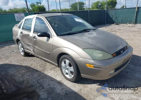 2004 Ford Focus Zts z USA, uszkodzony, nr VIN 1FAFP38Z84W183828